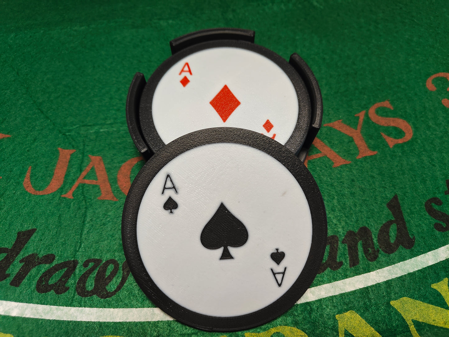 Drink coasters featuring the ace of each suit!